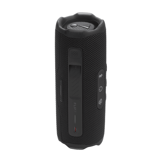 רמקול בלוטות' JBL Flip 7 שחור מוצג על שולחן